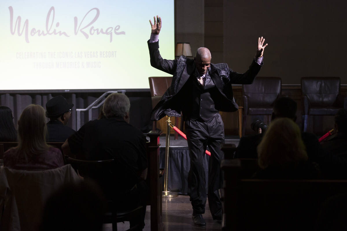 Tap dancer Ivery Wheeler performs during an event commemorating the Moulin Rouge, the first rac ...