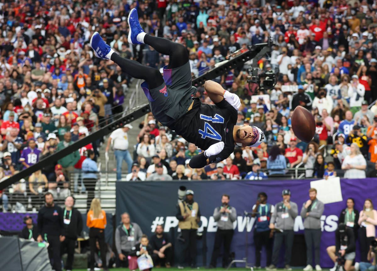 Detroit Lions wide receiver Amon-Ra St. Brown (14) makes a catch during the best catch football ...