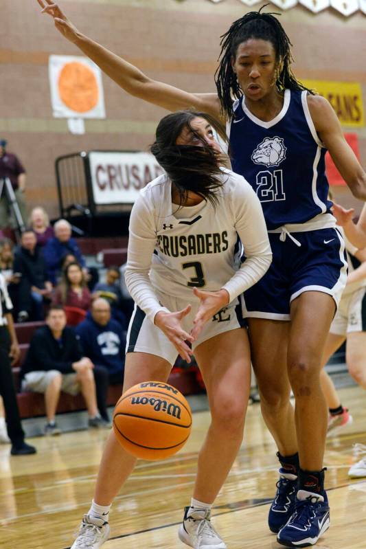 Faith Lutheran's Gabby Libonati (3) looses a ball as Centennial's Cici Ajomale (21) defends dur ...