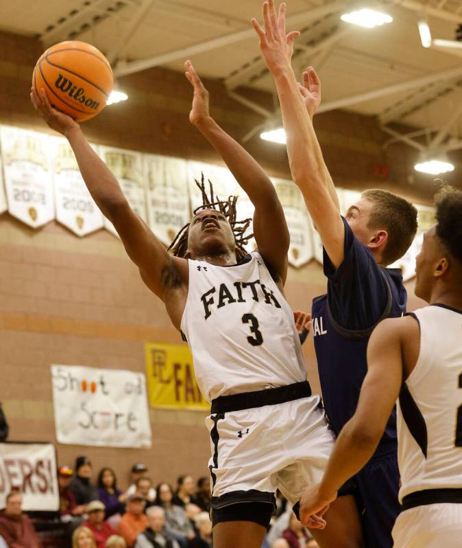 Faith Lutheran's Johnpaul Agu (3) shoots over Centennial's Toby Roberts (11) during the first h ...