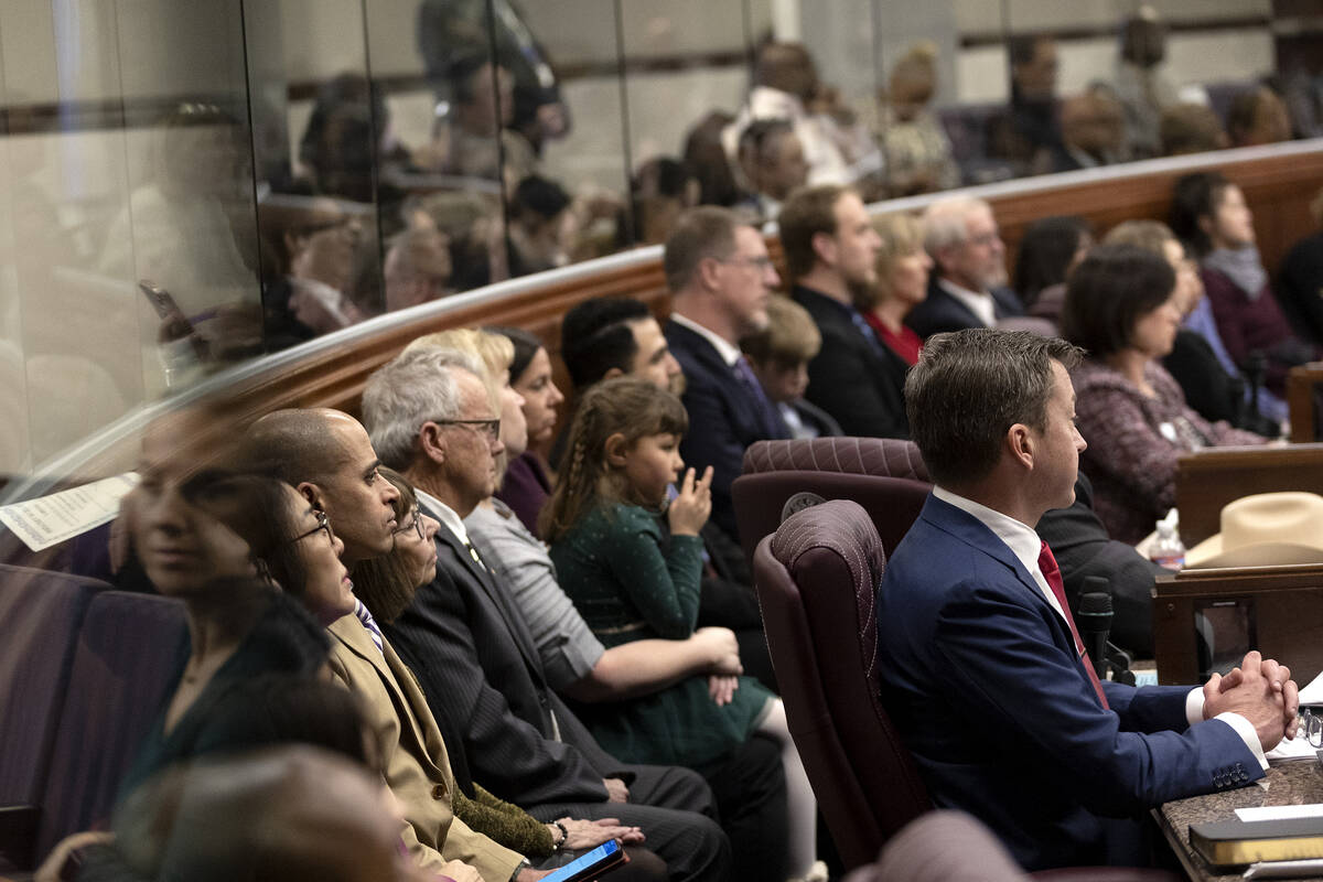 The Assembly, including Assemblyman Brian Hibbets, R-Las Vegas, right, is in session for the fi ...