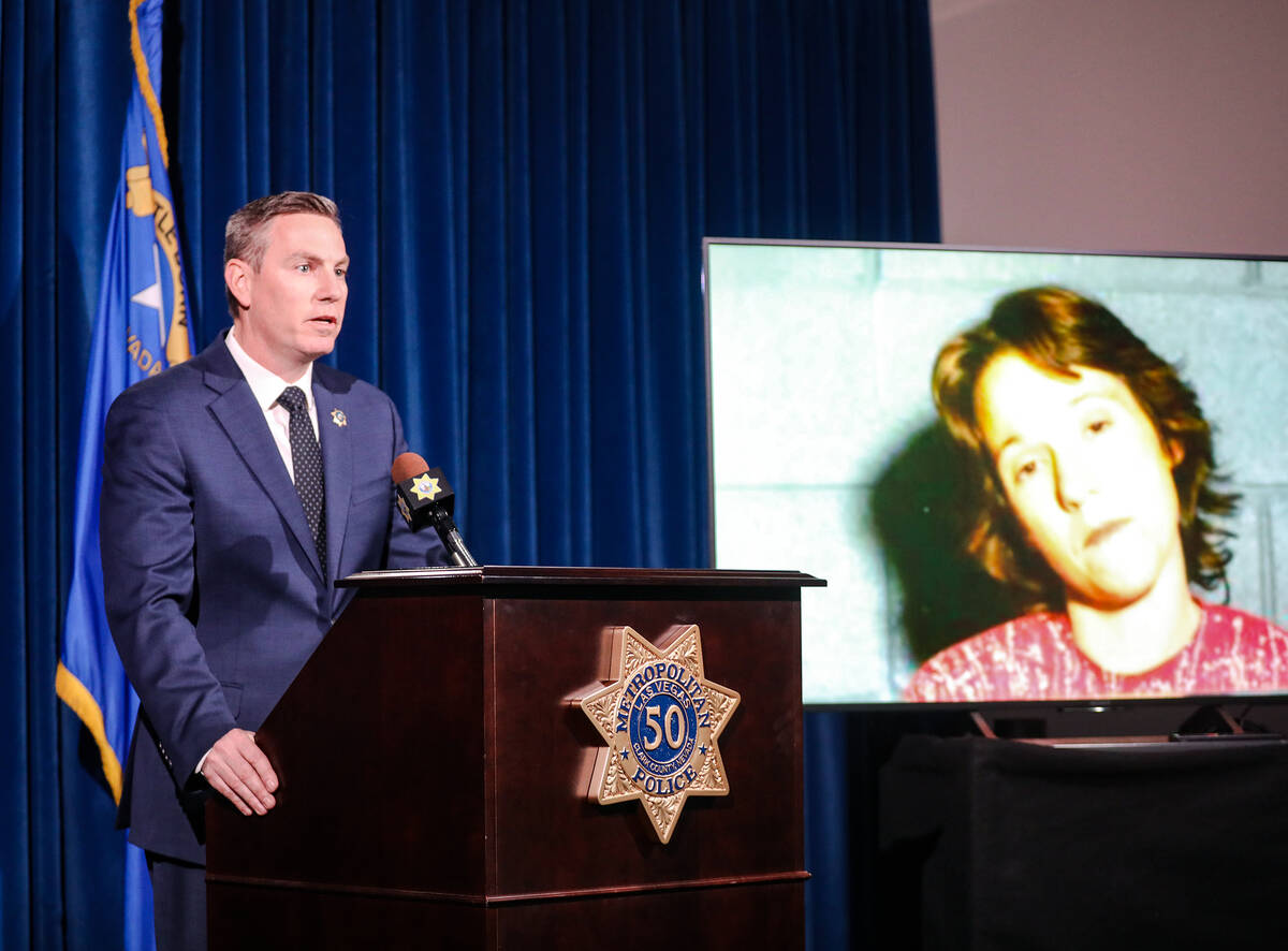 Metropolitan Police Department Lt. Jason Johansson, next to the image of victim Lori Ann Perera ...