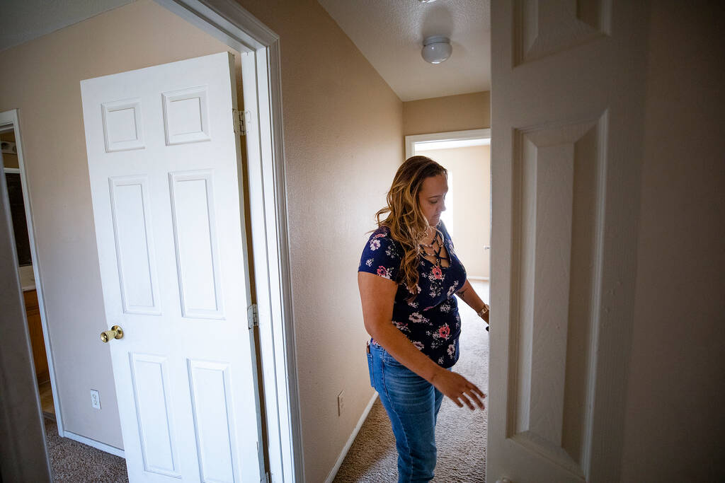 First-time homebuyer Amy Phinsee looks through a home for sale in the northeast part of Las Veg ...