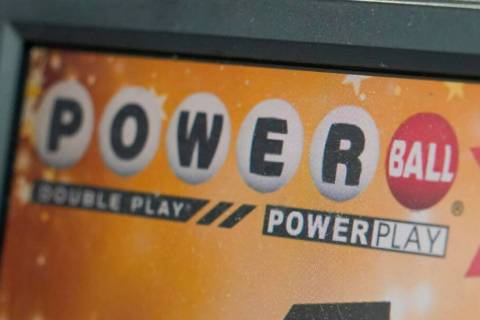 A display panel advertises tickets for a Powerball drawing at a convenience store, Nov. 7, 2022 ...