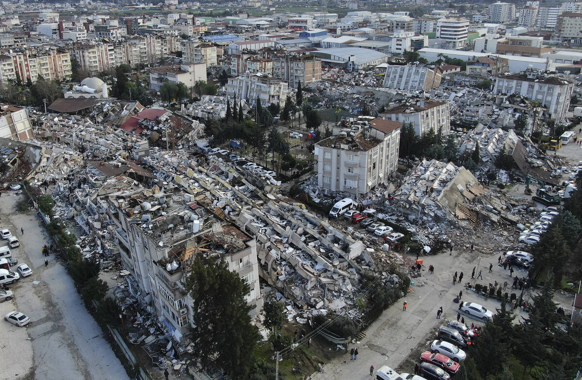 Aerial photo shows the destruction in Hatay city center, southern Turkey, Tuesday, Feb. 7, 2023 ...