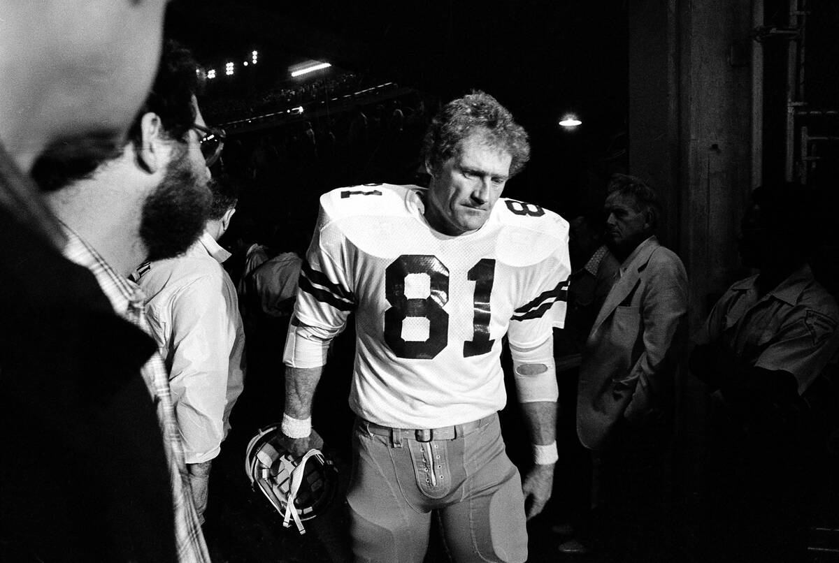 Jackie Smith (81), of the Dallas Cowboys, walks off the field after his team lost the Super Bow ...