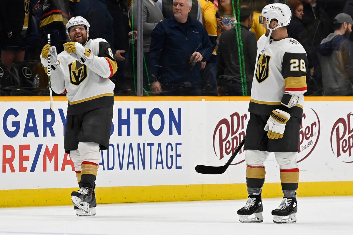 Vegas Golden Knights right wing Phil Kessel, left, and left wing William Carrier (28) leave the ...