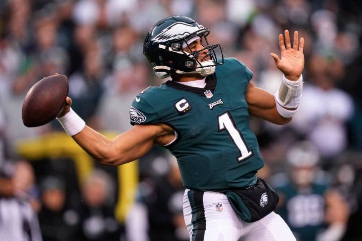Philadelphia Eagles quarterback Jalen Hurts passes during the first half of the NFC Championshi ...