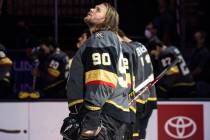 Golden Knights goaltender Robin Lehner (90) looks on while standing for the national anthem bef ...