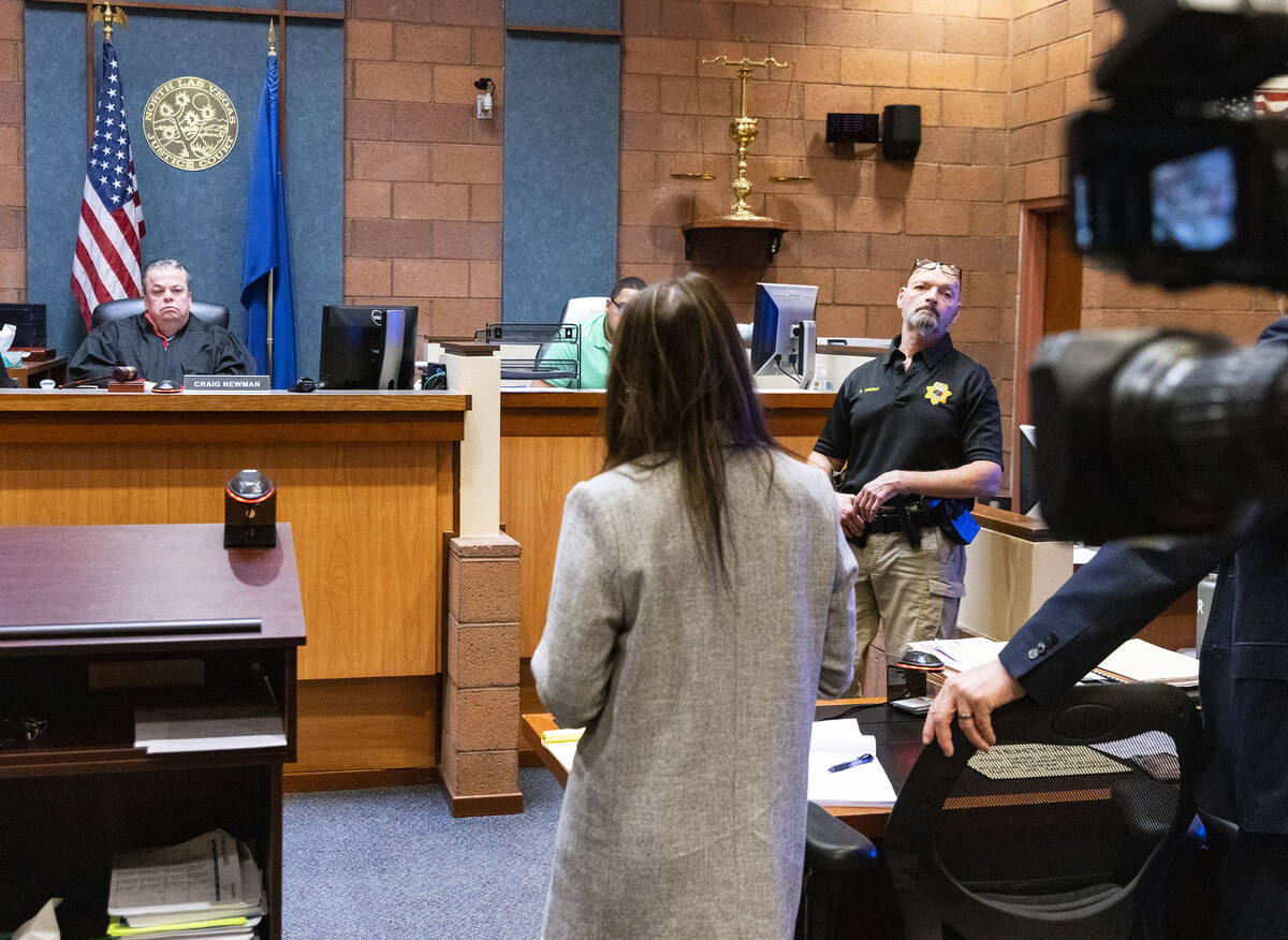 Kristy Holston, center, a public defender, representing former actor Nathan Lee Chasing His Hor ...