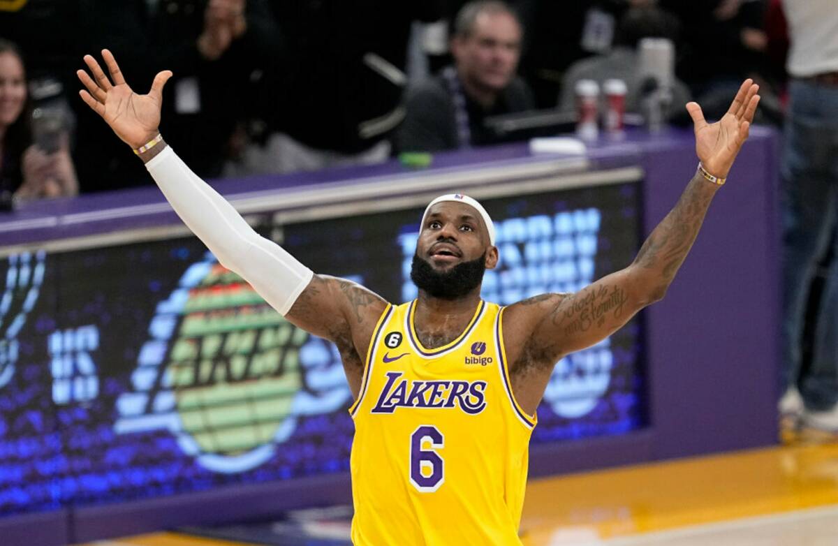 Los Angeles Lakers forward LeBron James celebrates after scoring to pass Kareem Abdul-Jabbar to ...