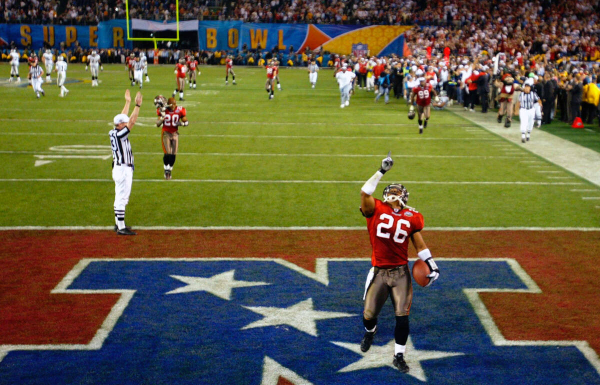 FILE - In this Jan. 26, 2003, file photo, Tampa Bay Buccaneers cornerback Dwight Smith (26) cel ...