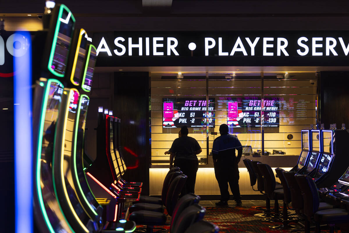 People stand by the player services and cashier cage at Wildfire Casino, slated to open this Fr ...