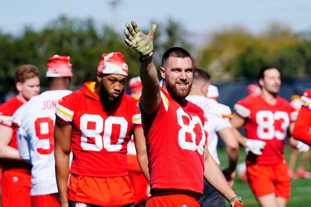 Kansas City Chiefs tight end Travis Kelce (87) waves to the sidelines as he warms up with teamm ...