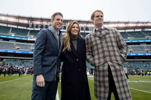 Kevin Burkhardt, Erin Andrews and Greg Olsen of Fox's NFL broadcast team smile for a photo on t ...