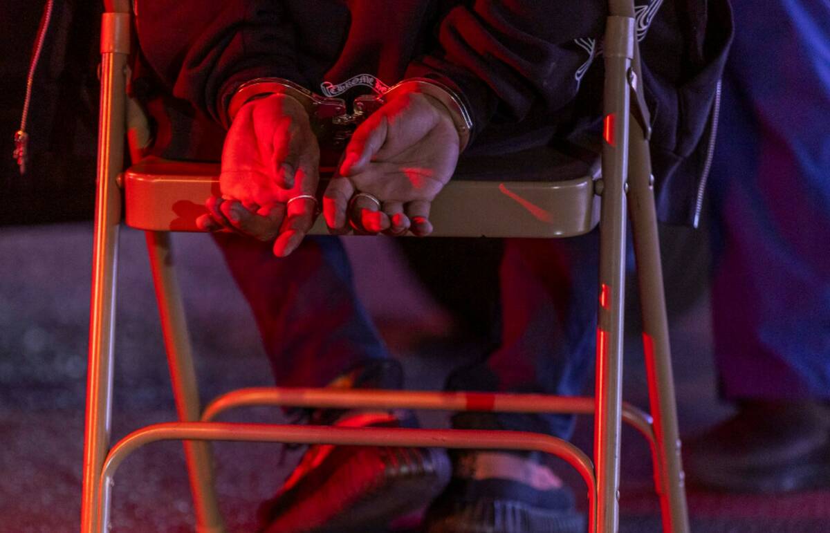 A man sits for a blood sample during Metro's "DUI blitz" in April 2022 in Las Vegas. (L.E. Bas ...