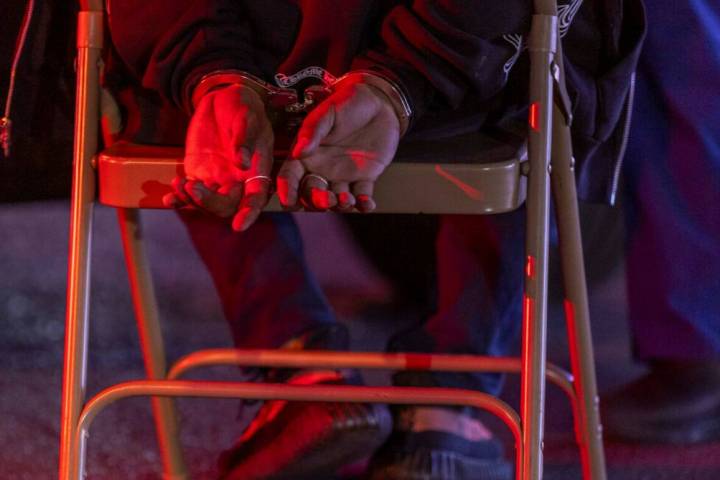 A man sits for a blood sample during Metro's "DUI blitz" in April 2022 in Las Vegas. (L.E. Bas ...