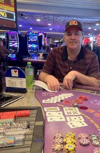 James Grimes of Fairfield, Ohio, won a jackpot of $124,000 on I Luv Suits poker Wednesday, Feb. ...