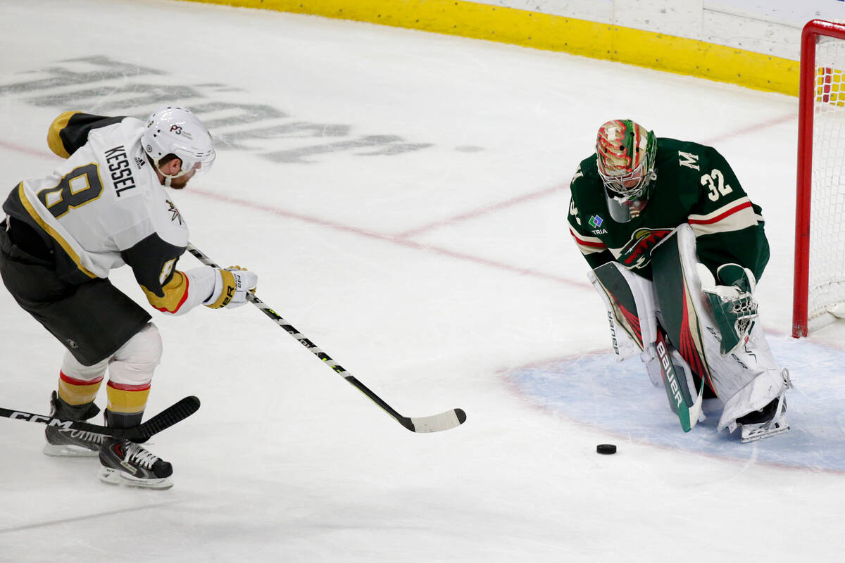 Minnesota Wild goaltender Filip Gustavsson (32) blocks a shot by Vegas Golden Knights right win ...