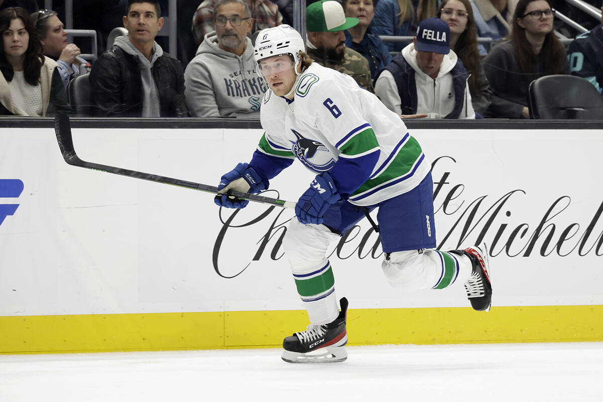 Vancouver Canucks right wing Brock Boeser (6) skates on the ice against the Seattle Kraken duri ...