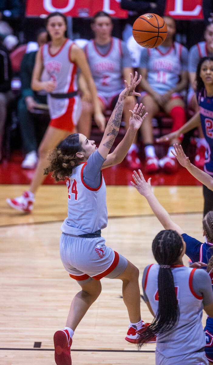 UNLV Lady Rebels guard Essence Booker (24) elevates for a shot against the Fresno State Bulldog ...