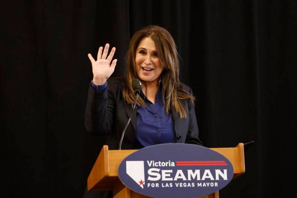 Las Vegas Councilwoman Victoria Seaman waves during a news conference to announce her bid to be ...