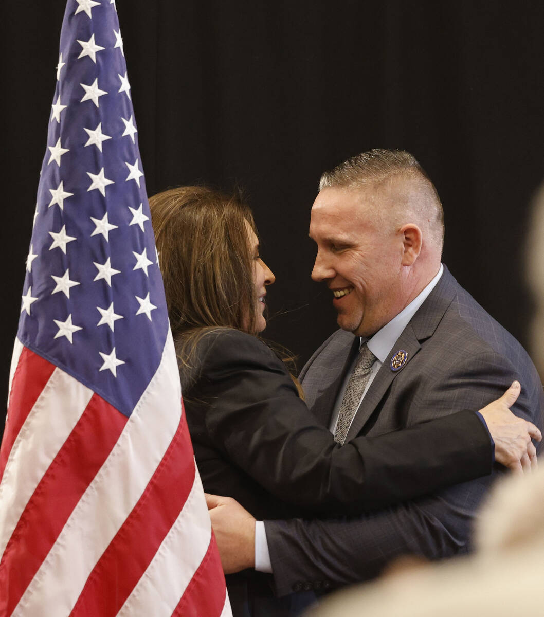 Las Vegas Councilwoman Victoria Seaman hugs Steve Grammas, president of the Las Vegas Police Pr ...