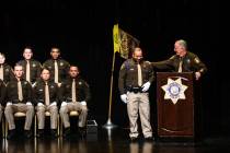 Clark Country Sheriff Joe Lombardo congratulates distinguished recruit Jose Grullon at the Metr ...
