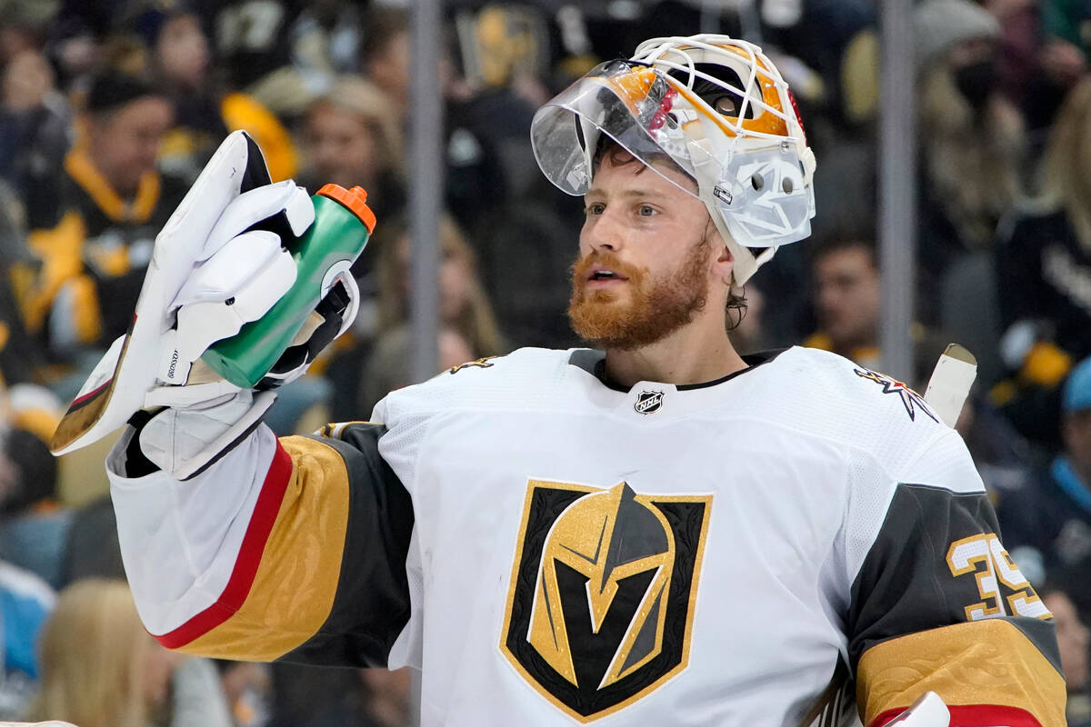 Vegas Golden Knights goaltender Laurent Brossoit takes a timeout during the second period of an ...