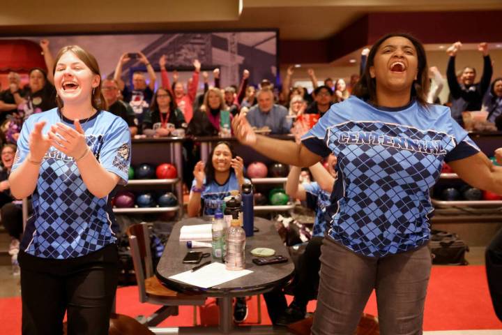 Centennial bowlers, including Chaya Lilley, left, and Tasia Massengale, cheer their teammates d ...