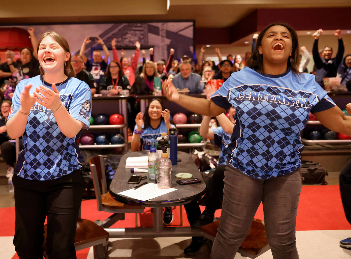 Centennial bowlers, including Chaya Lilley, left, and Tasia Massengale, rolls during the Class ...
