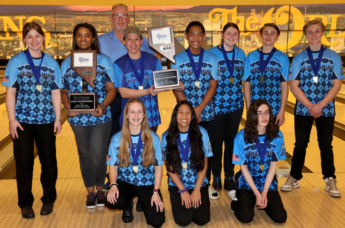Centennial coach Mark Lilley poses with the boys and girls bowling teams after both won the Cla ...