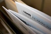 Internal Revenue Service 1040 Individual Income Tax forms for the 2016 tax year are arranged fo ...