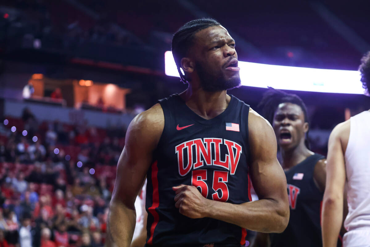 UNLV guard EJ Harkless (55) reacts after scoring against Dayton during the first half of an NCA ...