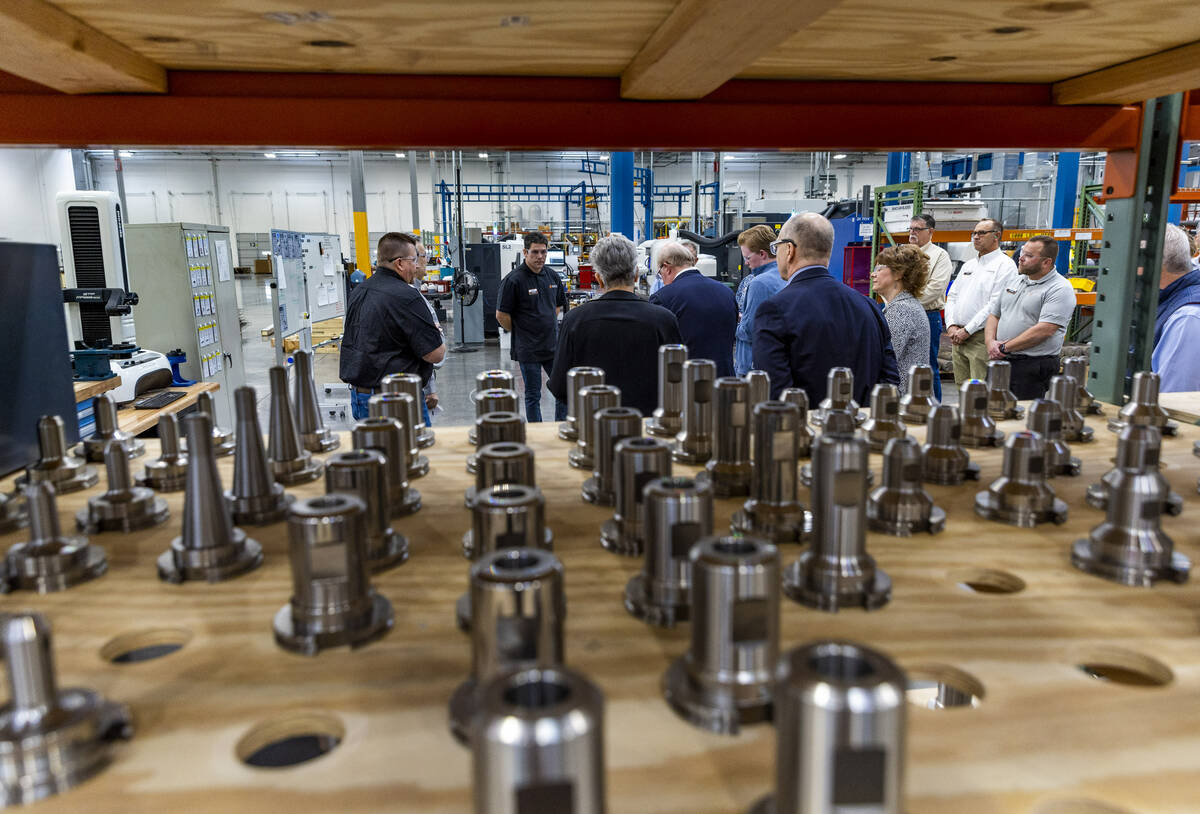 Machining parts await usage on ENTEK's production floor seen during a press tour as specialists ...