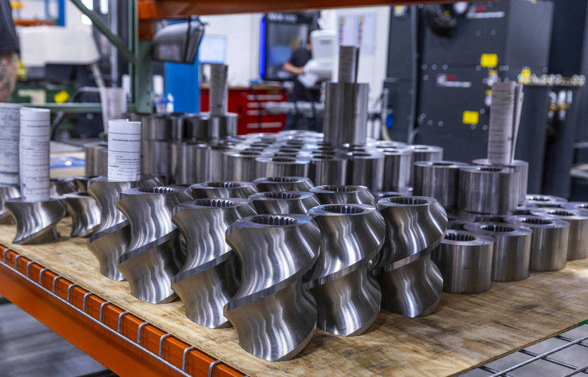 Outbound parts are organized for distribution in ENTEK's machine shop area during a press tour, ...
