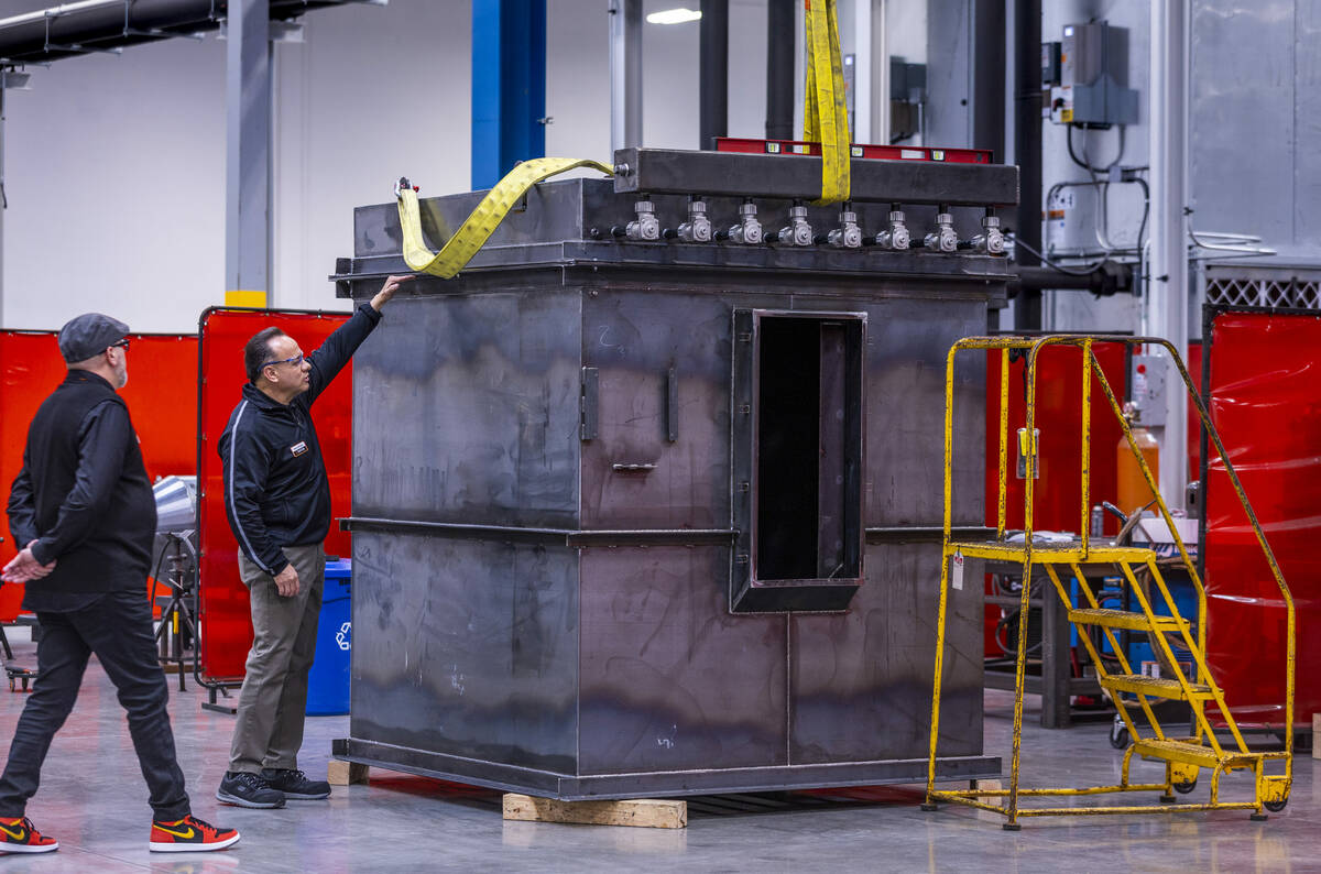 ENTEK's Rafael Arteaga speaks about a large piece created for air filtration there during a pre ...