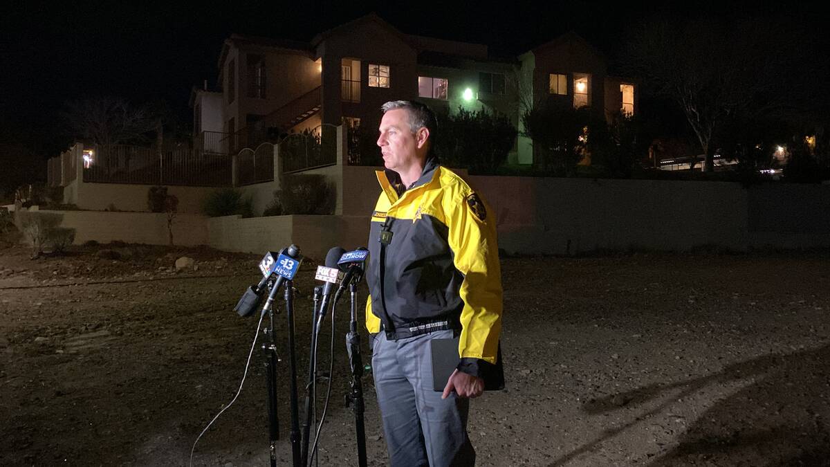 Metropolitan Police Department Lt. Jason Johansson briefs the media about a homicide investigat ...