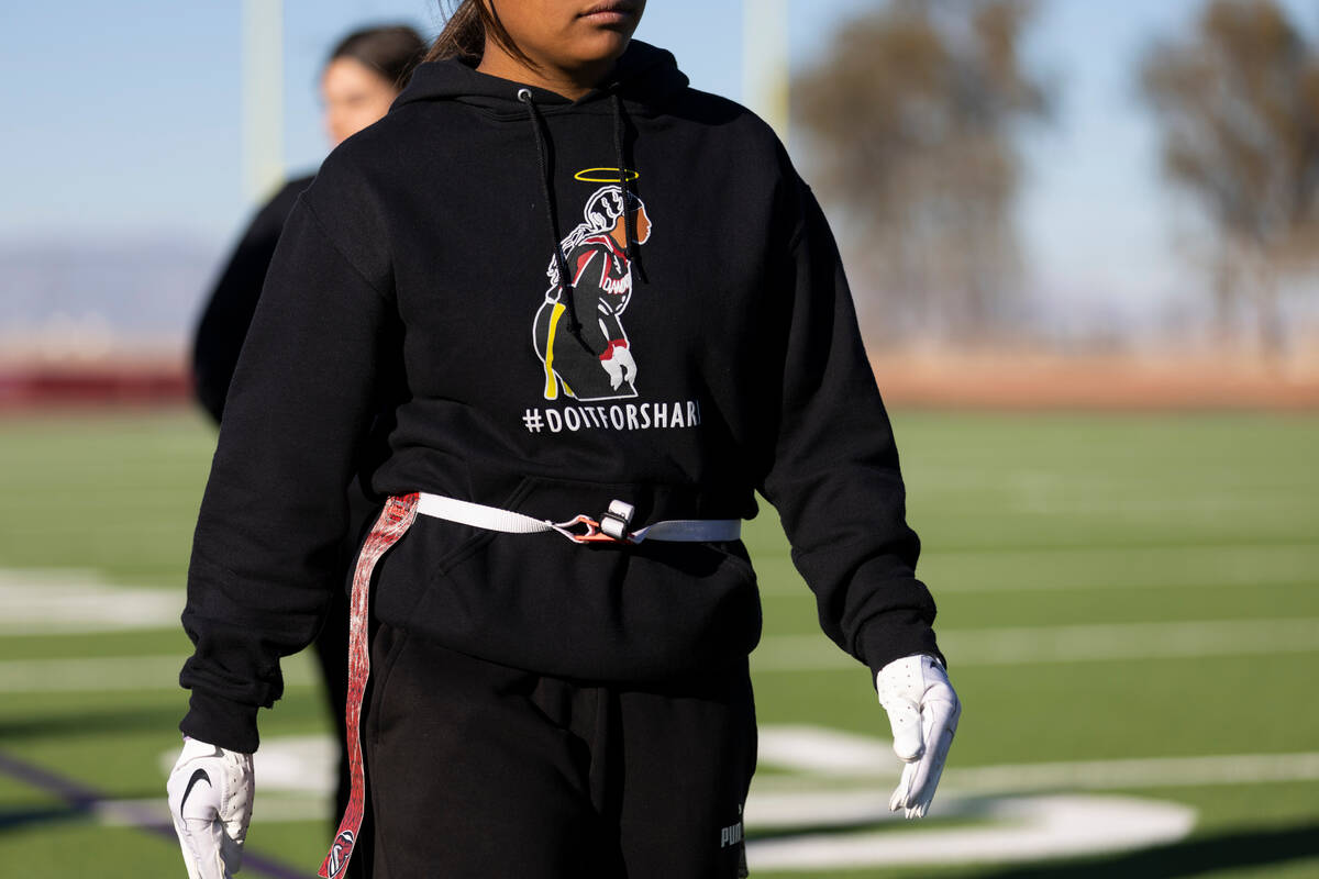 Tehani Koanui wears a sweater in remembrance of late teammate Ashari Hughes, during a flag foot ...