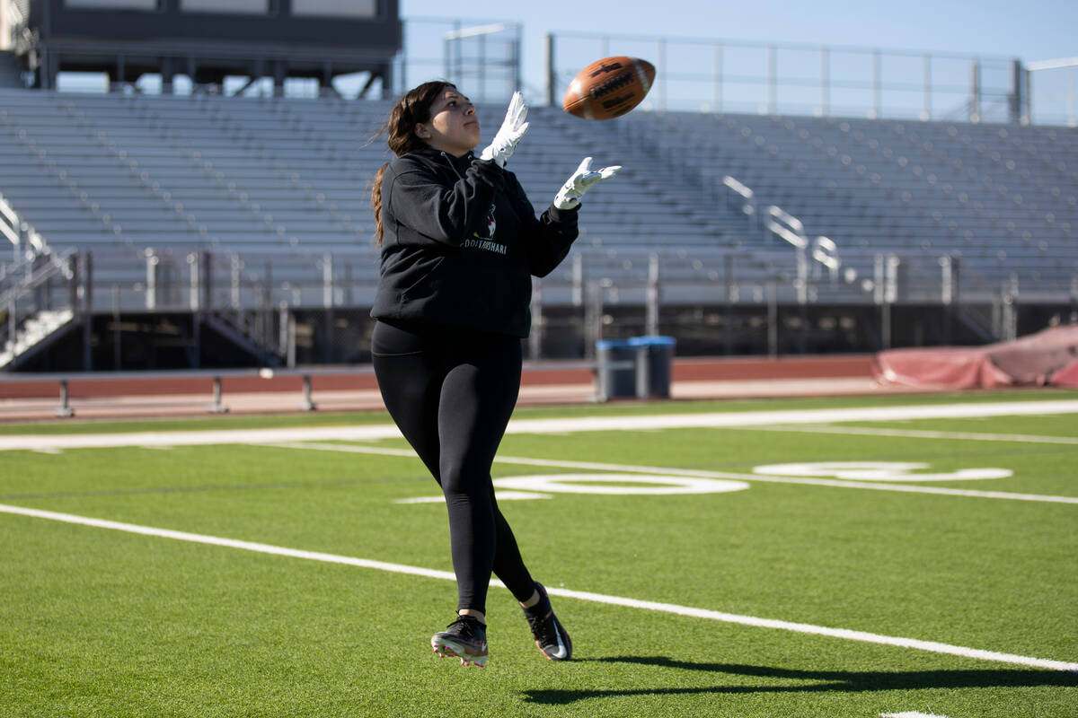 Victoria Campion makes a catch during a flag football practice at Desert Oasis High School in L ...