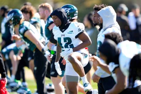 Philadelphia Eagles players stretch during an NFL football Super Bowl team practice, Friday, Fe ...