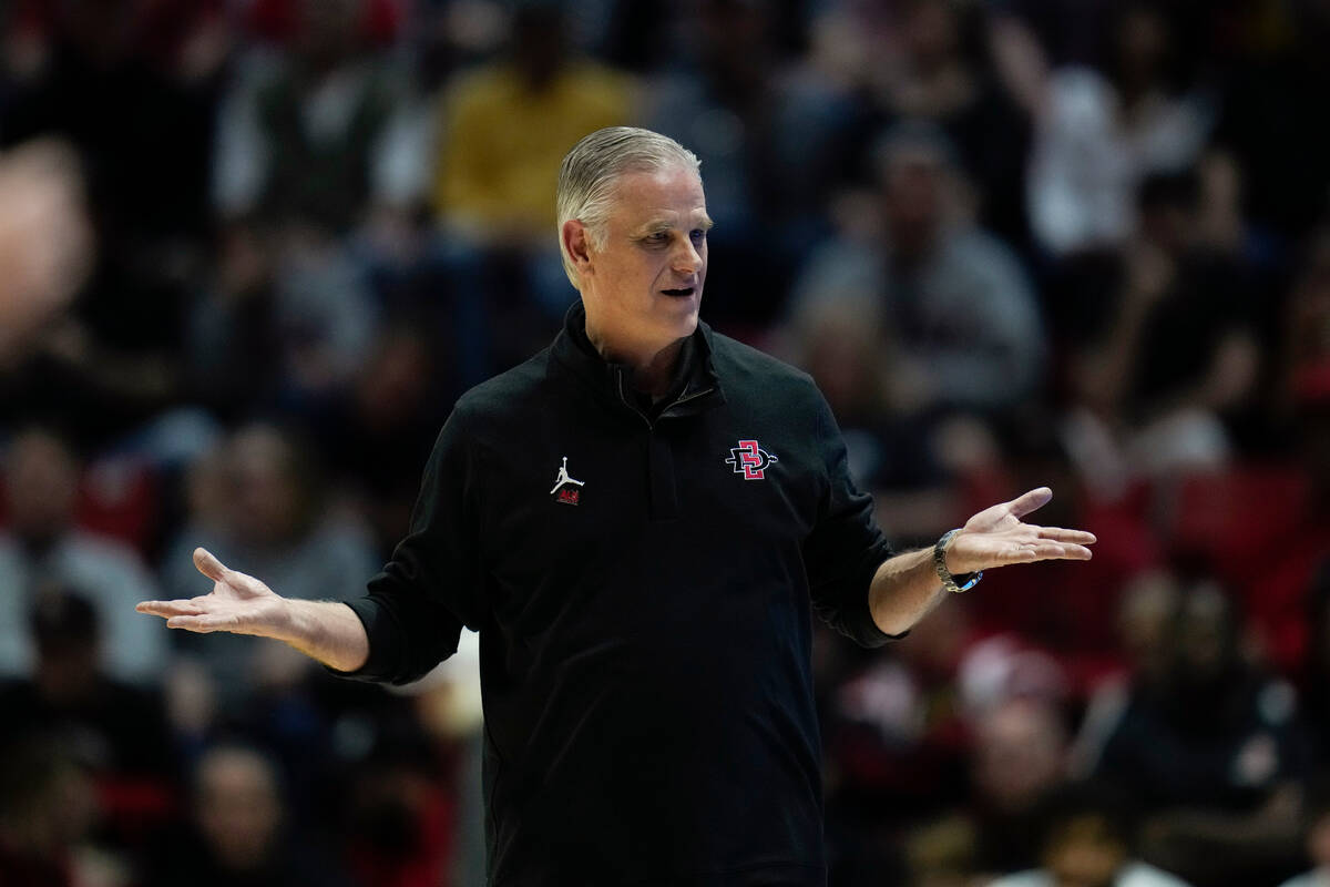 San Diego State head coach Brian Dutcher reacts during the first half of an NCAA college basket ...