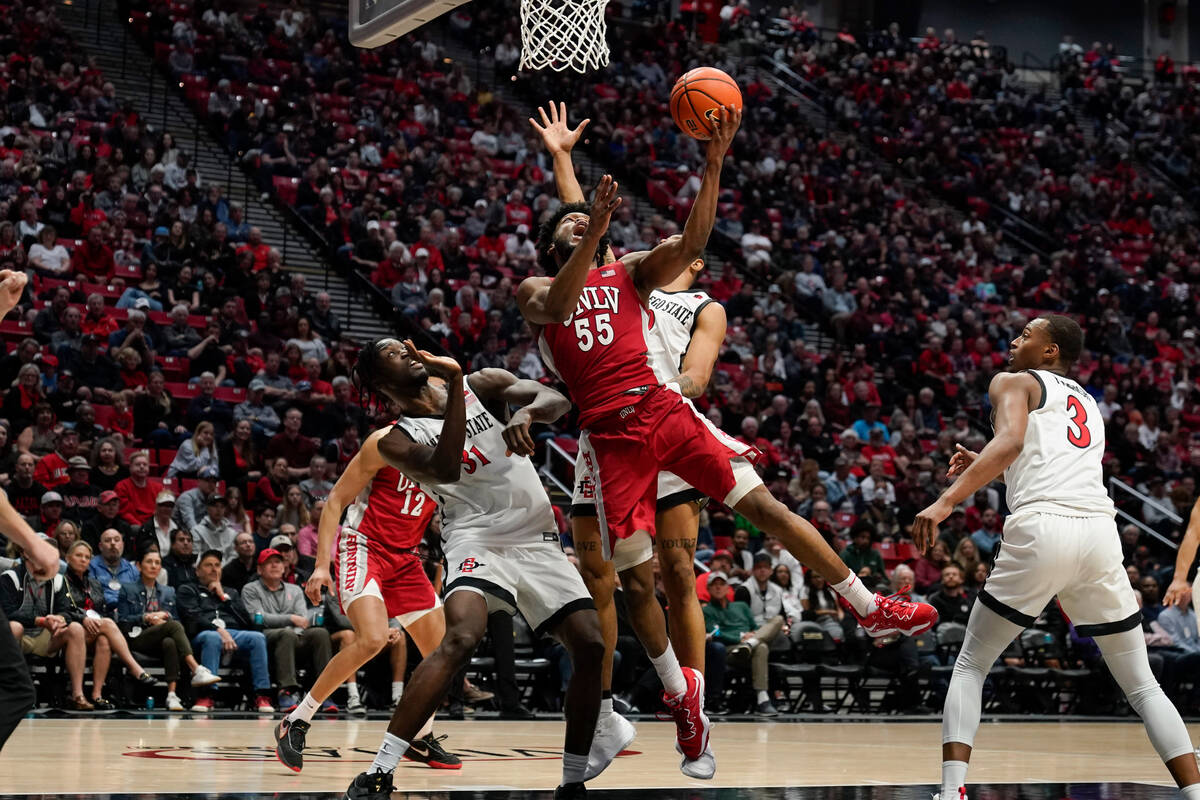 UNLV guard EJ Harkless (55) shoots during the second half of an NCAA college basketball game ag ...