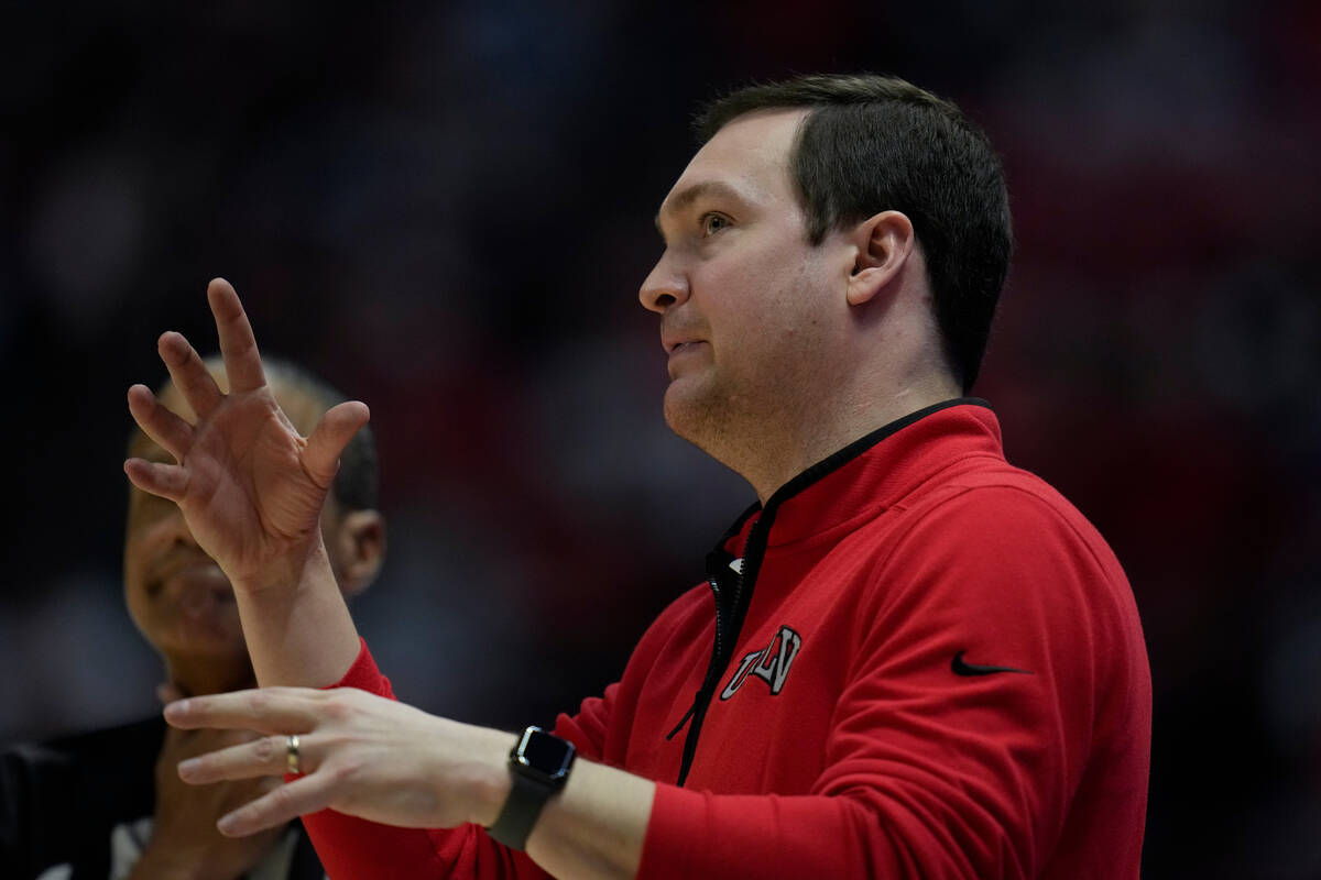 UNLV head coach Kevin Kruger gestures during the second half of an NCAA college basketball game ...