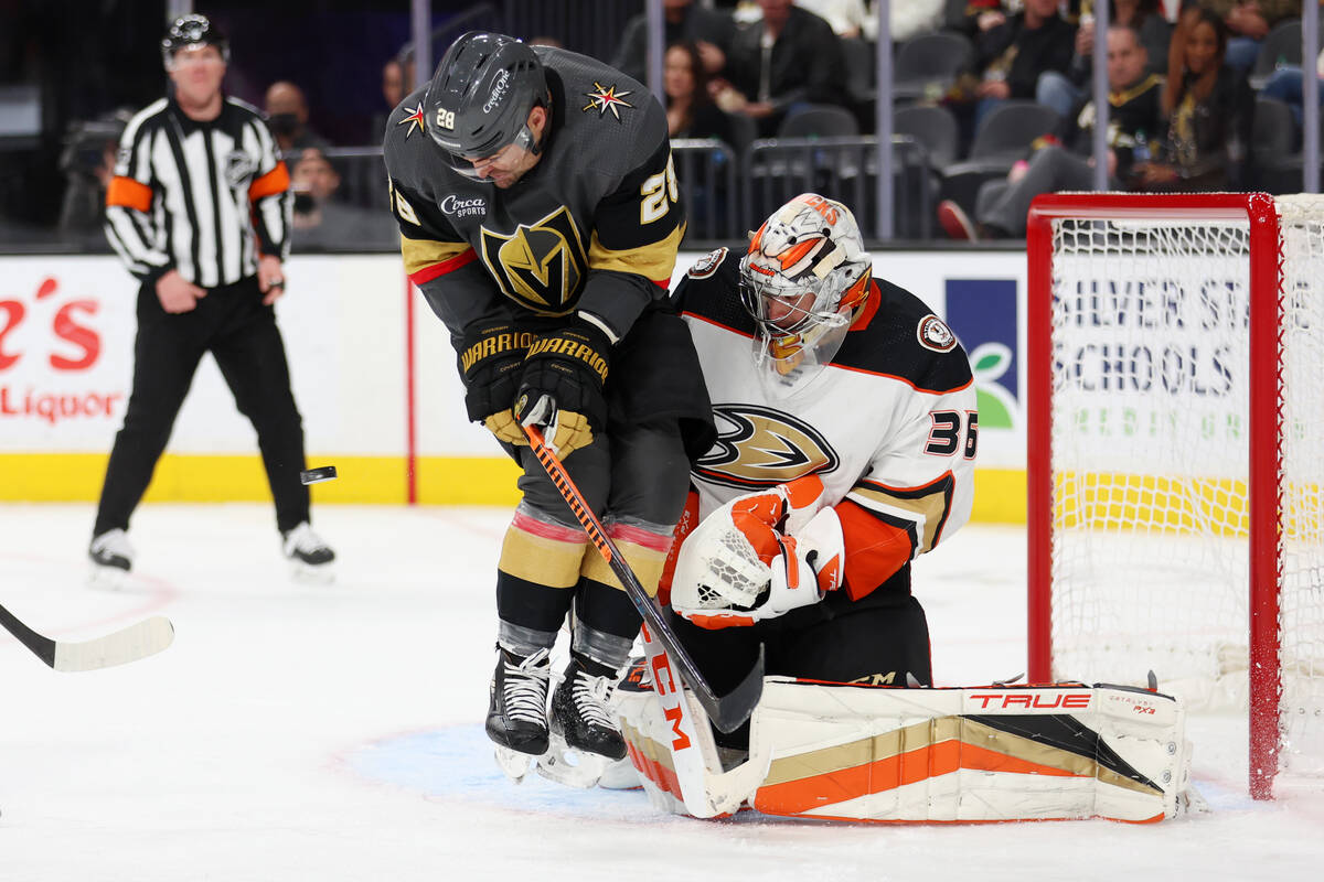 Anaheim Ducks goaltender John Gibson (36) defends a shot at the goal as Vegas Golden Knights le ...