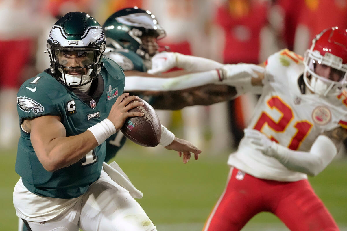 Philadelphia Eagles quarterback Jalen Hurts (1) runs against the Kansas City Chiefs during the ...