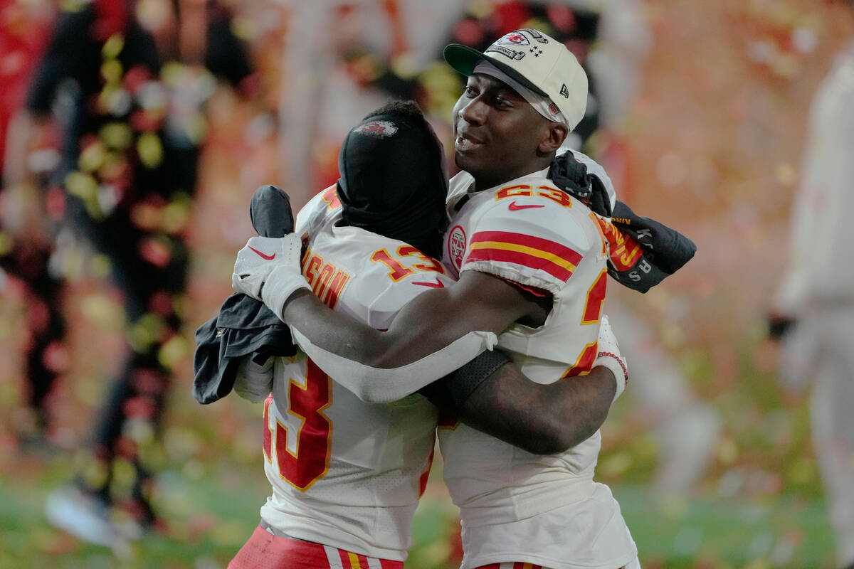 Kansas City Chiefs cornerback Joshua Williams (23) and safety Nazeeh Johnson (13) celebrate aft ...