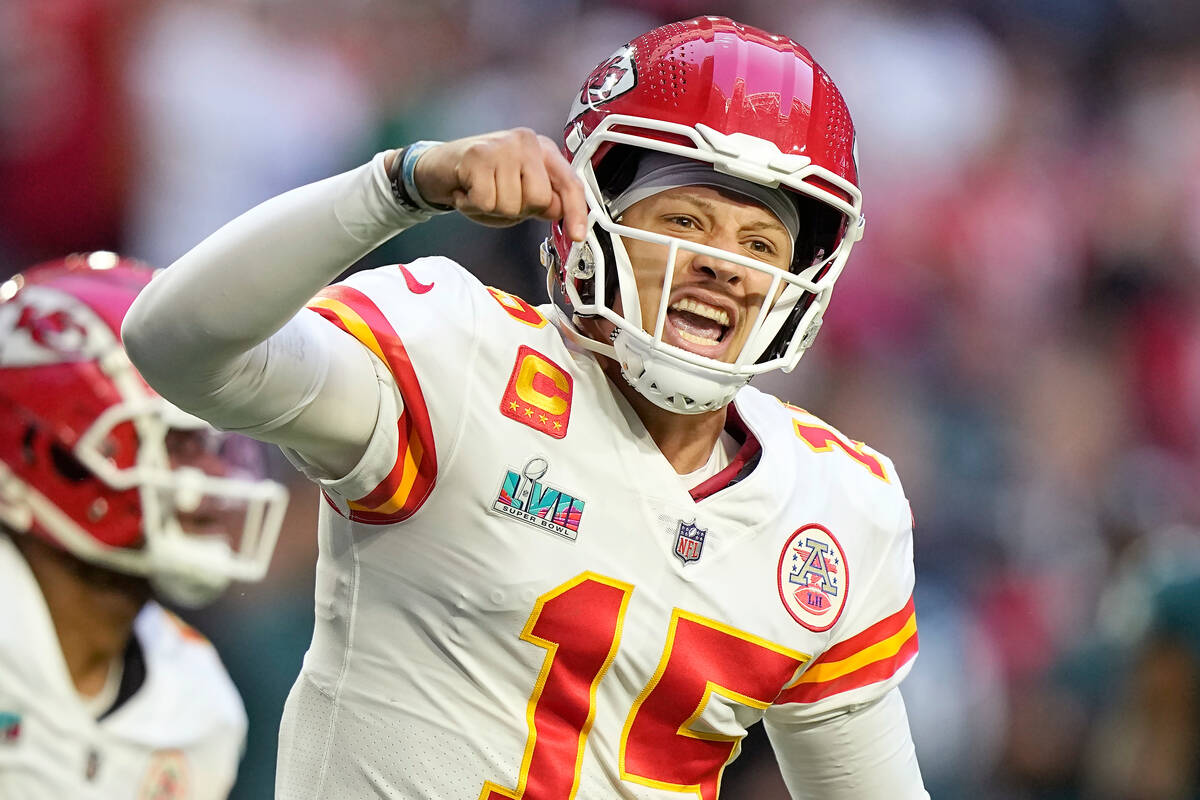 Kansas City Chiefs quarterback Patrick Mahomes (15) celebrates a touchdown against the Philadel ...