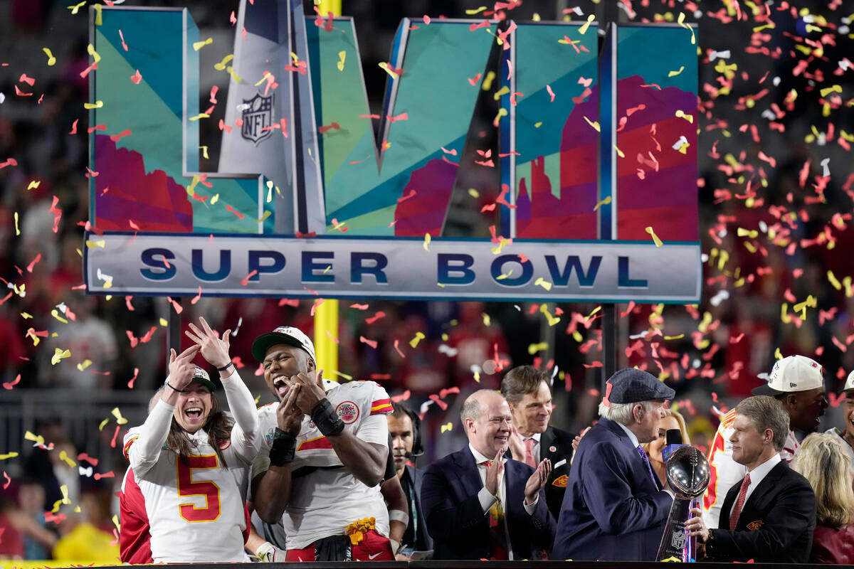 Kansas City Chiefs players and staff celebrate after the NFL Super Bowl 57 football game agains ...