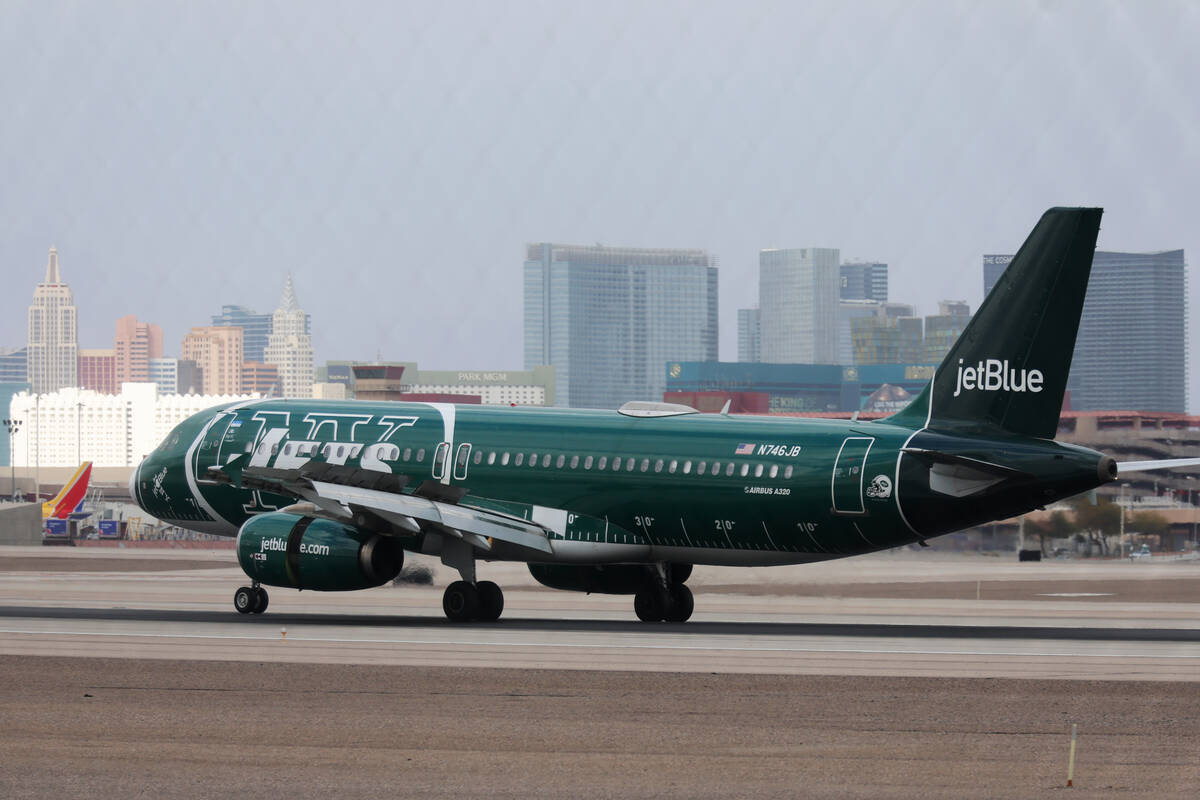 A JetBlue plane arrives to Harry Reid International Airport in Las Vegas, Tuesday, Feb. 14, 202 ...